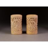 TWO VERY SIMILAR CHINESE LATE QING DYNASTY CARVED IVORY TUSK SECTION VASES, each profusely