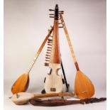 MODERN MIDDLE EASTERN RABOB, 34? (86.3cm) long, together with TWO TURKISH SAZ, the longest 33? (