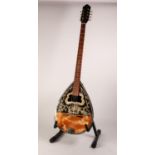 MODERN EIGHT STRING BOUZOUKI WITH JACK, the body decorated with leafy scroll work, 38 ¼? (97cm)