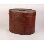 EARLY 20th CENTURY OVAL BROWN TIN HAT BOX with loop handle and hoop fastener containing a CHRISTIE &
