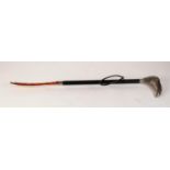 MODERN ITALIAN LONG STEM SIMULATED TORTOISE SHELL SHOE HORN with moulded white metal handle in the