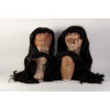 THIRTEEN LONG BLACK SYNTHETIC WIGS, individually bagged, contents of one box