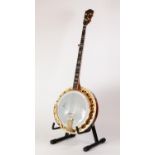 FRAMUS GOLD DELUX FIVE STRING BANJO WITH PICK-UP, the rim and arm rest with acid etched floral