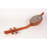 MODERN ABORIGINAL FOUR STRING GOURD HARP, with painted detail to the body, 27 ½? (70cm) long,