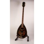 MODERN EKA, ITALIAN EIGHT STRING BOUZOUKI, the body decorated with foliate scroll work and lyres, 38
