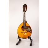 ANTONIOTSAI MODERN EIGHT STRING FLAT BACK MANDOLIN, with floral mother of pearl inlay to the back,