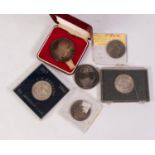 THREE AMERICAN SILVER KENNEDY HALF DOLLARS two being in hard plastic cases, one inscribed 'In