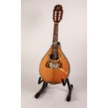 PROBABLY ANTONIOTSAI, MODERN EIGHT STRING FLAT BACK MANDOLIN, with mother of pearl inlay, the back