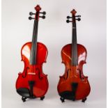 TWO STUDENT VIOLINS one marked Stentor with bows and in cases
