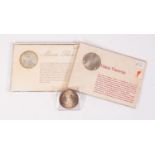 TWO MINT UNCIRCULATED MARIA THERESA SILVER THALERS, each card mounted and in plastic cases/covers