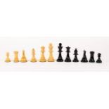 MODERN BOXWOOD AND EBONISED WOOD STAUNTON PATTERN CHESS SET with green baize covered bases, King 3