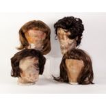 TWENTY FOUR SHORT MID TO DARK BROWN SYNTHETIC WIGS, individually bagged, contents of one box