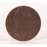 WORLD WAR I BRONZE IN MEMORIUM OR DEATH PLAQUE, awarded to Wynn Jones, in envelope folding card case