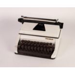 LILLIPUT MANUAL TYPEWRITER whir enamel brown and black with 8.75" (23.3) carriage