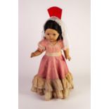 CIRCA 1940s COMPOSITION SPANISH COSTUME DOLL with sleeping brown eyes, black wig, with red
