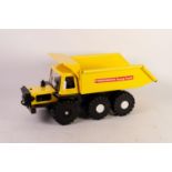 MARX TOYS MINT AND BOXED POWERHOUSE EARTH MOVERS DUMP TRUCK heavy duty steel yellow and black 19.75"