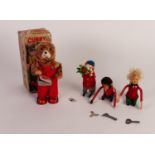 'MADE IN JAPAN' BOXED KEY WIND CUBBY THE READING BEAR AND THREE OTHER KEY WIND MECHANICAL TOYS OF