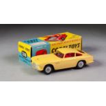 BOXED CORGI No 218 Aston Martin DB4 yellow with red interior in yellow and blue picture card box
