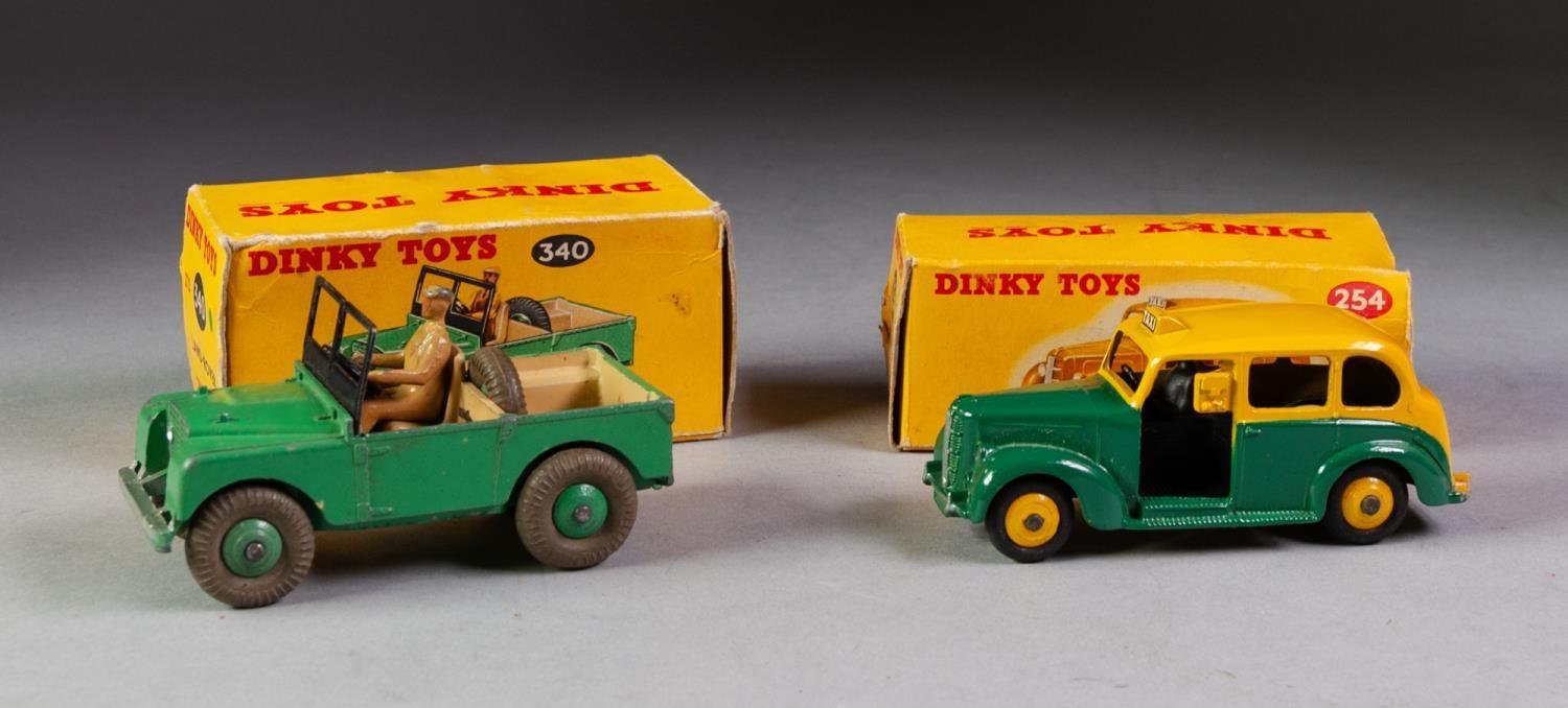 TWO BOXED DINKY COMMERCIAL TOYS No 254 Austin Taxi in green, yellow, yellow ridged hubs No 340