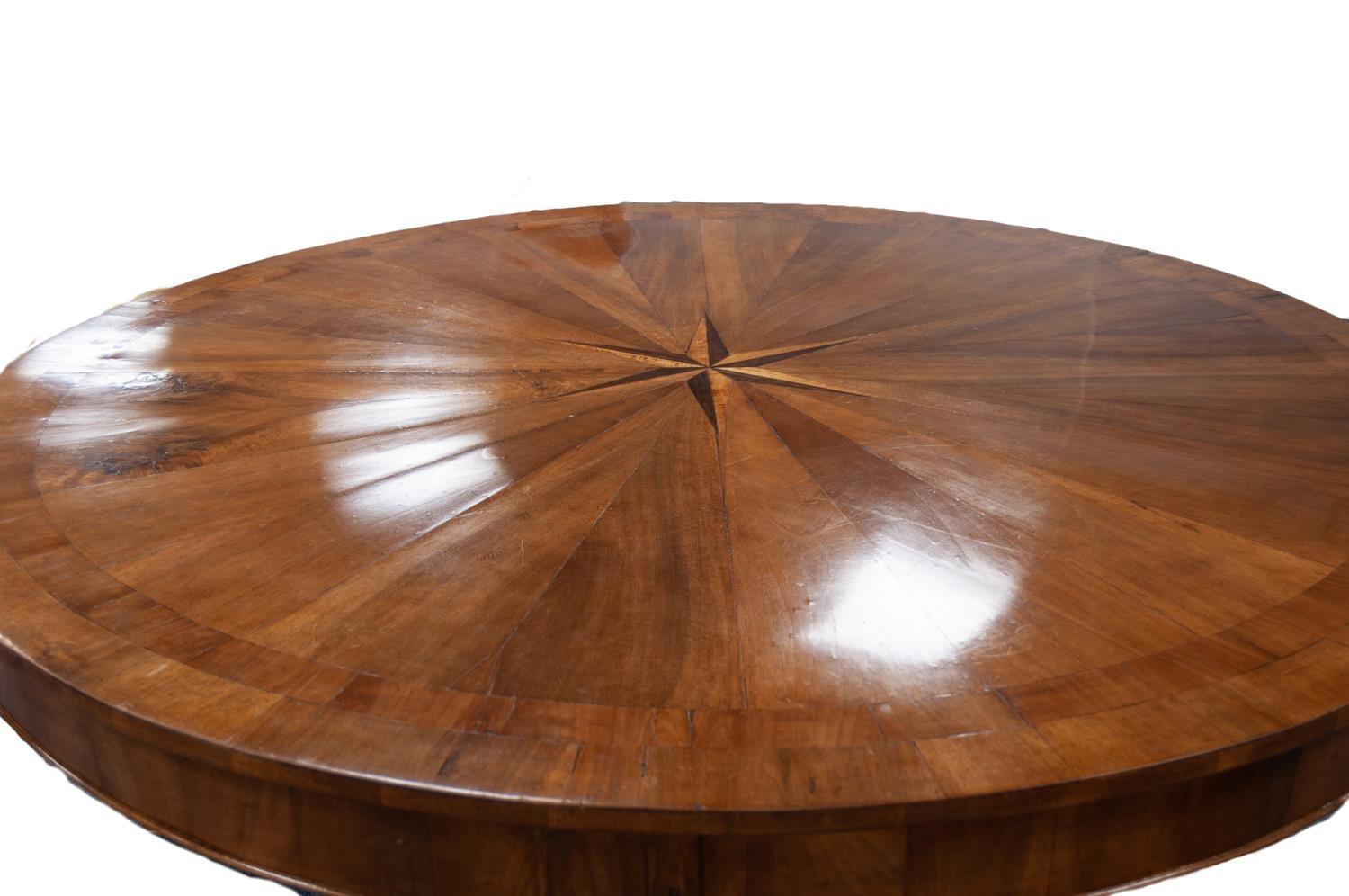 PROBABLY FRENCH, NINETEENTH CENTURY LARGE FIGURED WALNUT DINING TABLE, of circular form the top - Image 2 of 2