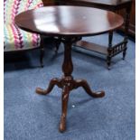 LATE GEORGIAN MAHOGANY REVOLVING TRIPOD OCCASIONAL TABLE, the circular top with birdcage support,