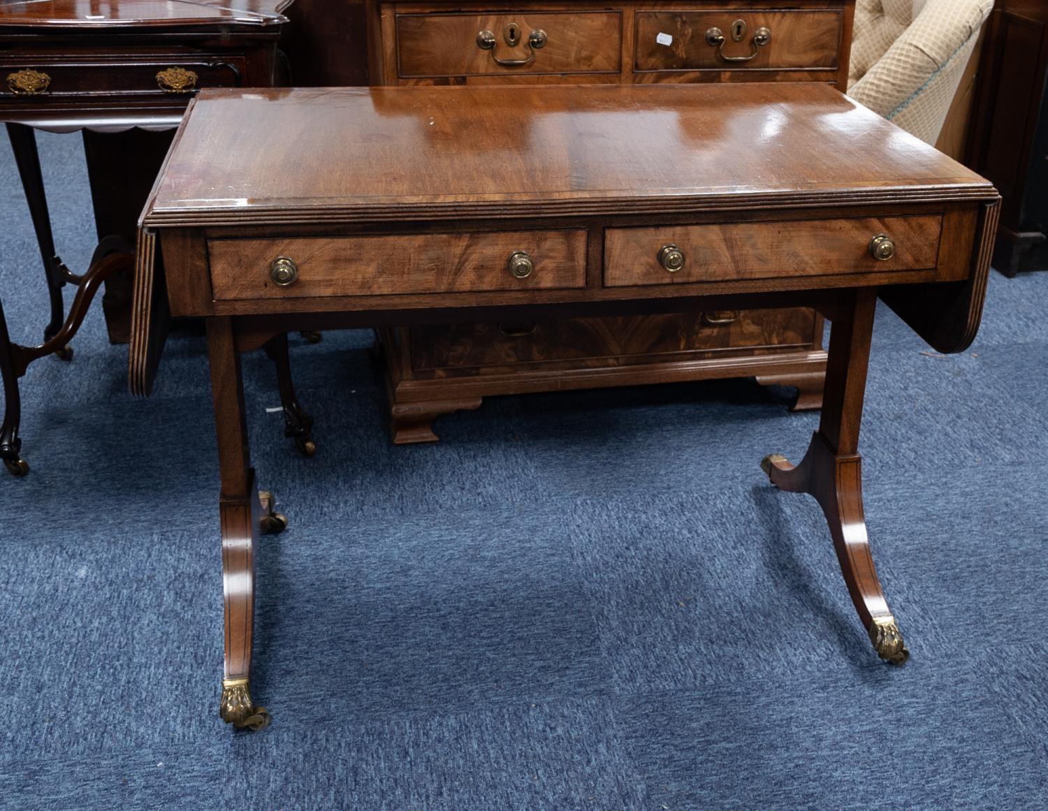 ANTIQUE FIGURED MAHOGANY SOFA TABLE, of typical form with crossbanded, rounded oblong top, the whole