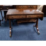 ANTIQUE FIGURED MAHOGANY SOFA TABLE, of typical form with crossbanded, rounded oblong top, the whole