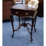 LATE VICTORIAN CARVED MAHOGANY ENVELOPE CARD TABLE, the square top with serpentine outline,