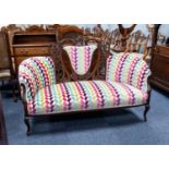 EDWARDIAN CARVED MAHOGANY DRAWING ROOM TWO SEATER SETTEE, the show-wood centre section with carved