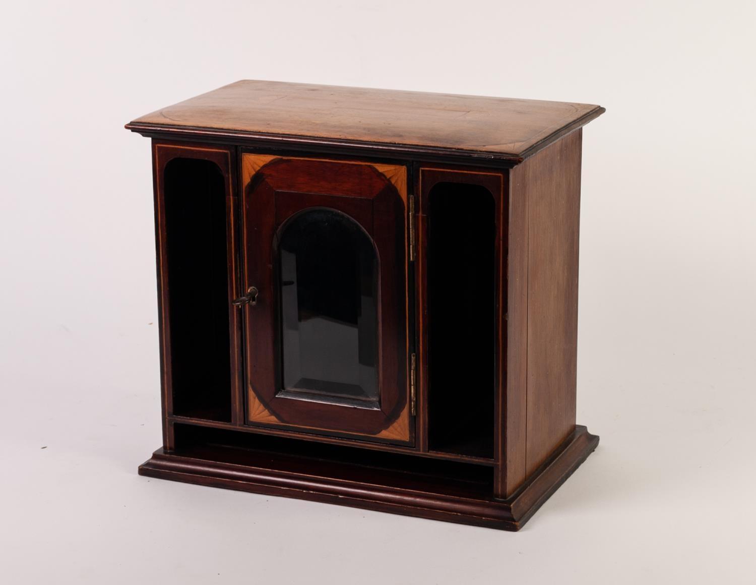 EDWARDIAN INLAID MAHOGANY TABLE TOP CABINET, the moulded oblong top above a glazed cupboard door,