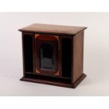 EDWARDIAN INLAID MAHOGANY TABLE TOP CABINET, the moulded oblong top above a glazed cupboard door,