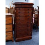 GOOD QUALITY VICTORIAN FIGURED MAHOGANY WELLINGTON CHEST, the oblong top above a flame cut frieze