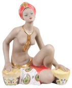 A large centuryI.A. Manna Italian pottery figure of a semi nude dancer titled 'Kalahari'