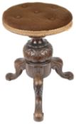 A Victorian mahogany swivel top piano stool