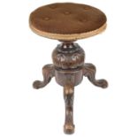 A Victorian mahogany swivel top piano stool