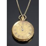An 18K gold fob watch on a 9ct gold chain