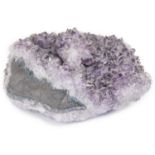 A large amethyst crystal geode