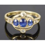 An attractive Arts & Crafts sapphire and diamond set ring