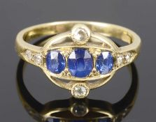 An attractive Arts & Crafts sapphire and diamond set ring