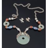 An early 20th century Chinese jade, silver and enamel pendant necklace