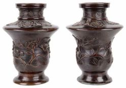 A pair of Japanese bronze vases, Meji period vases