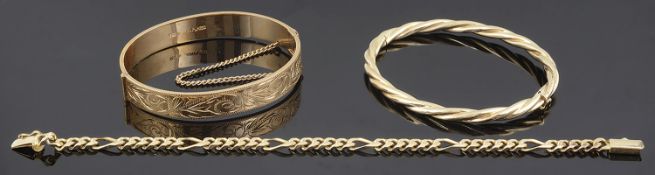 A Continental 14K gold twist hinged bangle