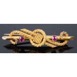 A Victorian 15ct gold ruby set rope twist bar brooch