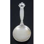 A Georg Jensen silver caddy spoon