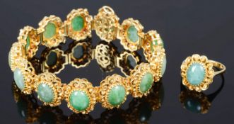 A Continental contemporary yellow metal filigree and jade panel bracelet and matching ring