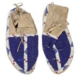 A pair of Native American full size beaded moccasins