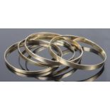 Four 9ct stiff bracelets