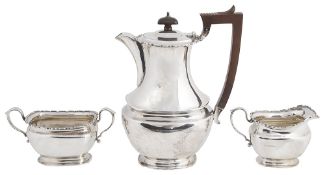 A George V three piece silver tea service, hallmarked Birmingham 1926