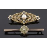 An Edwardian peridot and seed pearl bar brooch and another