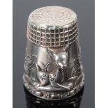 An unusual Sterling silver thimble,